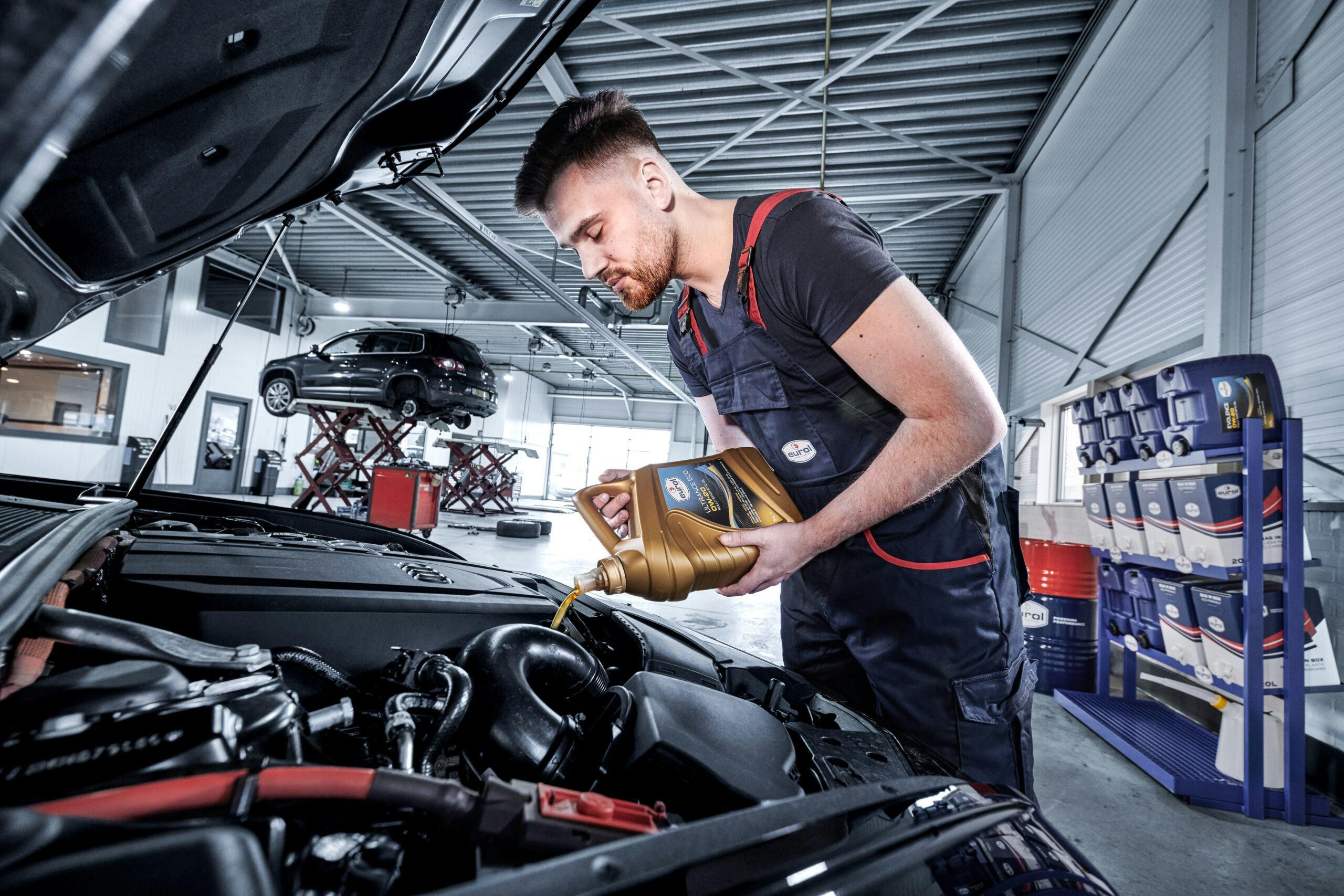 A Mechanic is Repairing & Servicing Car